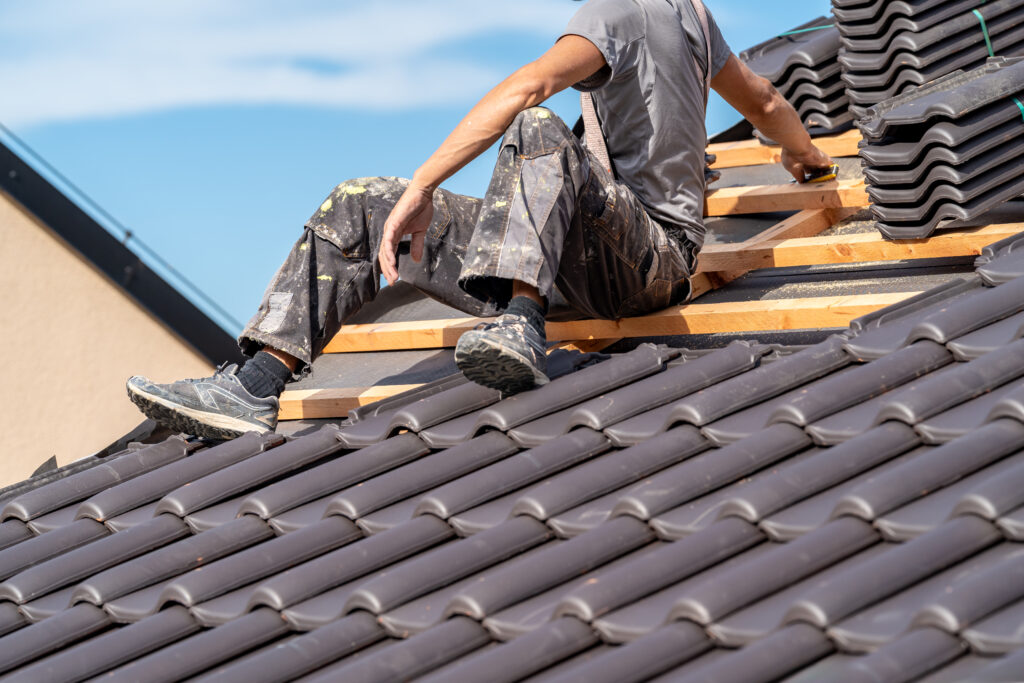 Kirby Smith - installation-of-roofing-by-a-craftsman-ceramic-ti-2023-11-27-05-04-39-utc-scaled.jpg